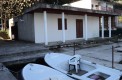 Дом в Игало на берегу реки Суторины, в 50 метрах от моря со своим причалом.
