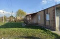 Дом с коммерческим помещением на просторном участке в Даниловграде