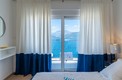 Новая роскошная вилла с панорамным видом в 10 метрах от моря в Крашичи